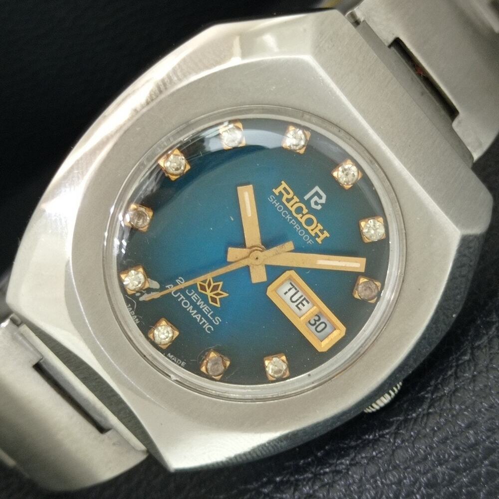 Vintage 1975 Ricoh Automatic Mens Silver Watch W/daydate & Blue accents